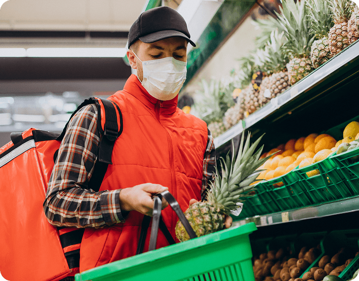 Delivery rider picking groceries in store